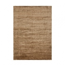 Inspired by the luster of European velvet, artisans create this Ralph Lauren rug's rich heathered texture by blending long threads of different hand-spun yarns--a technique known as abrash.Available in five spice hued colorways. Inspired by the luster of European velvet, artisans create this Ralph Lauren rug's rich heathered texture by blending long threads of different hand-spun yarns--a technique known as abrash.Available in five spice hued colorways.