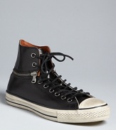 An edgy, vintage-inspired sneaker from Converse balances a familiar silhouette with modern accents and quality materials for an innovative take on a classic.