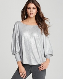 Exclusive to Bloomingdale's, this dolman-sleeve silhouette gets glam thanks to an all-over dusting of metallic foil atop this Joie sweater.