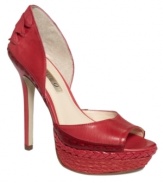Pumps with their own personality. Open sides, topstitching and an espadrille-style platform set the Tizrah peep-toe pumps by Boutique 9 apart from the rest.