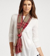 A textural design with baby fringe detail in a luxurious cashmere and merino wool blend. 55% extra fine merino wool/45% cashmereAbout 17¾ X 78¾Dry cleanImported 