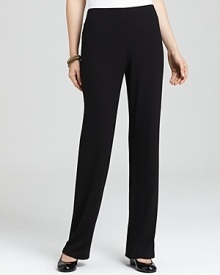 Clean lines and a classic cut create a wear-anywhere silhouette on these black Eileen Fisher pants. Clean lines and a classic cut create a wear-anywhere silhouette on these black Eileen Fisher pants.