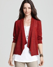 The essential cardigan gets a makeover in this Eileen Fisher sweater, styled with a shapely silhouette, an open front and pointed hem. The essential cardigan gets a makeover in this Eileen Fisher sweater, styled with a shapely silhouette, an open front and pointed hem.