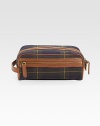 A signature tartan plaid design appoints this fine canvas toiletry bag with heritage appeal. Leather trim Side handle Zip closure 9W X 6¼H X 5½D Imported 