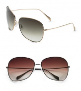 Ultra lightweight titanium with signature logo at temple end. Available in gold with olive gradient lens or walnut with spice brown lens. 100% UV protection Imported