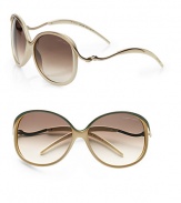 Feminine style with metal accented temples, top rim and bridge on a lightweight, acetate frame. Available in light gold ruthenium with brown gradient lens. Logo etched lens100% UV protectionMade in Italy 
