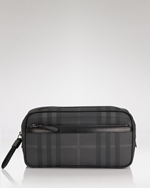 A smart and timeless travel accessory, the Burberry Coalburn Washbag offers a luxe dopp kit that makes jet-setting in style a task that's never been easier. A smart and timeless travel accessory, the Burberry Coalburn Washbag offers a luxe dopp kit that makes jet-setting in style a task that's never been easier.