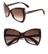 Oversized bowtie shaped resin frames with signature T logo temple. Available in shiny dark havana with brown gradient lens. 100% UV protection Made in Italy
