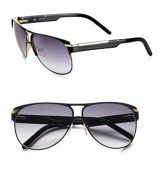 These polished frames are embellished with goldtone accents for a luxurious design. Available in black/gold with smoke gradient lens. Signature temples100% UV protectionMade in Italy 