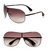 A sleek design with logo accented temples. Available in dark ruthenium with brown gradient lens. Logo temples100% UV protectionImported