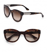 From the Chevron Collection. These lightweight, acetate frames are accented with chevron metal temples. Available in tortoise with double brown gradient lens. Metal accented chevron temples100% UV protectionImported