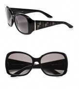 Make a stylish statement with these chic, plastic frames with logo accented temples. Available in black with grey gradient lens or brown with brown gradient lens. Logo temples100% UV protectionMade in Italy 