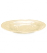 Celebrated chef and writer Sophie Conran introduces dinnerware designed for every step of the meal, from oven to table. A ribbed texture gives this tan platter from Portmeirion the charm of traditional hand-thrown pottery.