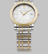 Silver dial etched with 18k gold accents on two-tone stainless steel bracelet. Quartz movement Round case Date display Second hand Markers Made in Switzerland