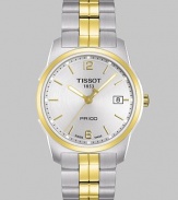 From the T-Classic Collection. An elegant, uncluttered timepiece in sleek stainless steel with goldtone accents.Precision Swiss quartz ETA movement Water-resistant to 100M Goldtone and stainless steel bezel Round stainless steel case; 38mm diameter (1.5) Scratch-resistant sapphire crystal Silver dial Golden Arabic numerals and hour markers Second hand Date display at 3:00Two-tone link bracelet Foldover push-button clasp Made in Switzerland