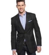 This dark slim fit blazer from Tommy Hilfiger adds to your nighttime allure with modern sizing and style.
