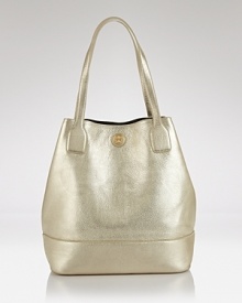 Tory Burch's uptown style shines by day with this tote. Crafted of leather and sized to take anywhere (and carry everything,) this metal must-have is oh so ready to rock. Tory Burch's uptown style shines by day with this tote. Crafted of leather and sized to take anywhere (and carry everything,) this metal must-have is oh so ready to rock.