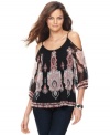 Show off your shoulders with INC's three-quarter-sleeve top, featuring an embellished print.