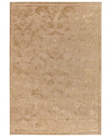 Enhance your decor with the oh-so-luxe look of Couristan's Pave Vintage Damask rug. Woven of a soft blend of viscose, silk and chenille for an unbelievably plush feel and a high-low carved effect, the rug features an elegant damask motif rendered in a luminous pearl shade, adding a touch of vintage-inspired glamour to any space. Enhance your decor with the oh-so-luxe look of Couristan's Pave Vintage Damask rug. Woven of a soft blend of viscose, silk and chenille for an unbelievably plush feel and a high-low carved effect, the rug features an elegant damask motif rendered in a luminous pearl shade, adding a touch of vintage-inspired glamour to any space.