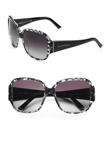 A feminine design inlayed with real Dolce & Gabbana lace on the front frame and solid temples. Available in black with grey gradient lens.Acetate frame with crystal lens UV 400 lens 100% UV protective Made in Italy A feminine design inlayed with real Dolce & Gabbana lace on the front frame and solid temples. Available in black with grey gradient lens.Acetate frame with crystal lens UV 400 lens 100% UV protective Made in Italy
