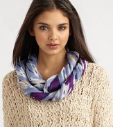 A pretty tribal print with raw edge details. ModalAbout 40 X 80Dry cleanImported 