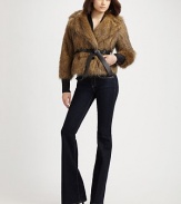 Lush faux fur takes on vintage appeal in this cropped double-breasted silhouette.Shawl collar Double-breasted button front Princess seams Self-belt Inseam pockets About 22¼ from shoulder to hem 70% modacrylic/30% acrylic Dry clean Imported