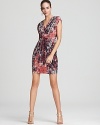 Splashed in a color-soaked print, this Akiko dress is the perfect pick for office-to-cocktail hour wear.