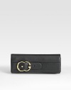 Leather evening bag with double G detail and antiqued goldtone hardware.Magnetic snap closure One inside pocket Leather lining 10½W X 5H X 3/4D Made in Italy