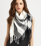 This lightweight style boasts an iconic print and all-around fringe details. CottonAbout 43¼ X 47¼Dry cleanImported 