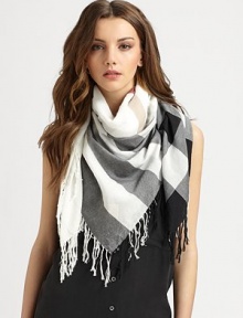 This lightweight style boasts an iconic print and all-around fringe details. CottonAbout 43¼ X 47¼Dry cleanImported This lightweight style boasts an iconic print and all-around fringe details. CottonAbout 43¼ X 47¼Dry cleanImported