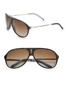 An acetate style with logo emblem at bridge. Available in black palladium with gray polor lens or havana blue/gold with brown polar lens. Logo temples 100% UV protection Imported An acetate style with logo emblem at bridge. Available in black palladium with gray polor lens or havana blue/gold with brown polar lens. Logo temples 100% UV protection Imported