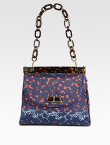 A charming floral print canvas style accented with glossy resin and radiant hardware.Chain shoulder strap, 8 dropMagnetic snap flap closureOne zip and two open inner compartmentsOne inside zip pocketTwo inside open pocketsCotton lining11W X 9½H X 3DImported A charming floral print canvas style accented with glossy resin and radiant hardware.Chain shoulder strap, 8 dropMagnetic snap flap closureOne zip and two open inner compartmentsOne inside zip pocketTwo inside open pocketsCotton lining11W X 9½H X 3DImported