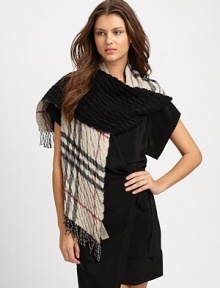 A warm, cashmere and wool blend with a textured quilted design in a mega check pattern accented with fringe. 50% cashmere/50% woolAbout 71 X 10Dry cleanImported A warm, cashmere and wool blend with a textured quilted design in a mega check pattern accented with fringe. 50% cashmere/50% woolAbout 71 X 10Dry cleanImported