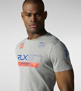 A sporty cotton jersey tee is adorned with vibrant race-inspired graphics for a modern, athletic look.