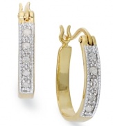Outside appeal. This pair of hoop earrings, crafted from 18k gold over sterling silver, truly sparkles with round-cut diamonds (1/10 ct. t.w.). Approximate drop: 5/8 inch. Approximate diameter: 1/2 inch.