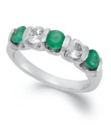 Perfect your look with enviable sparkle. This unique, channel-set ring features round-cut emeralds (3/4 ct. t.w.) and white sapphires (5/8 ct. t.w.) in sterling silver. Size 7.