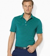 Primed for performance in moisture-wicking stretch jersey, this comfortable polo boasts a handsome striped pattern for the utmost style on and off the course.