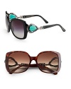 Acetate square frames with lavish stone embellished temples inspired by the one-of-a-kind Bvlgari emerald earrings sold in 2010. Available in black pearl with emerald colored stone and grey gradient lens or dark havana with smoke colored stone and brown gradient lens.UV 400 lens Made in Italy 