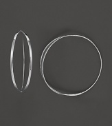 Get flirty with Lana's 14K white gold hoops. With an endless closure and sleek front split, these earrings add just the right amount of shine to your style.