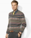 Knit from hearty wool yarns, a timeless V-neck sweater boasts a classic Fair Isle pattern for an authentic, handsome look.