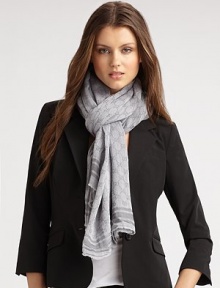 Lightweight cotton stole in a signature GG pattern with striped solid border.About 49 X 76 Cotton; dry clean Made in Italy Lightweight cotton stole in a signature GG pattern with striped solid border.About 49 X 76 Cotton; dry clean Made in Italy