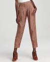 A new vision of workday chic rendered in a fresh, spicy hue, these Theory pants flaunt a high waistline, feminine pleats and a on-trend, cropped silhouette.