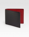 A contrasting interior lends a remarkably modern touch to a simple wallet style, rendered in lightly-pebbled leather with eight slots, providing ample storage of all your credit cards and other essentials.One bill compartmentEight card slotsLeather4W x 4HImported