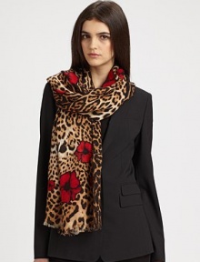 A sheer design featuring luxurious silk with a chic leopard print. SilkAbout 27½ X 78¾Dry cleanMade in Italy A sheer design featuring luxurious silk with a chic leopard print. SilkAbout 27½ X 78¾Dry cleanMade in Italy