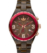Earthy brown and bold pink collide on this sporty Cambridge watch by adidas. Translucent brown plastic bracelet and round brown nylon case with rose-gold tone and pink aluminum bezel. Brown grid-patterned dial features applied rose-gold tone numerals and stick indices, minute track, date window, three multifunctional subdials, three hands, logo and pink accents. Quartz movement. Water resistant to 50 meters. Two-year limited warranty.