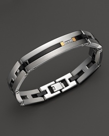 Striking onyx, a glittering diamond and bright 14K gold enhance the gleam of sterling silver. By Dolan & Bullock. From the Onyx & Diamond Collection. Striking onyx, a glittering diamond and bright 14K gold enhance the gleam of sterling silver. By Dolan & Bullock. From the Onyx & Diamond Collection.