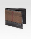 The ultimate accessory for any well-dressed man of style, crafted in signature check printed cotton and logo embossed leather.One billfold compartmentSix card slotsLeather/cotton4W x 4HImported