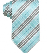 Check yourself. This classic patterned tie from Geoffrey Beene ups the ante on your 9-to-5 style.