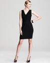 Imbue your look with dark romance in this DKNY dress. Black lace accentuates a deep neckline for after-hours appeal.