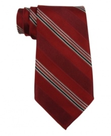 Simple. Subtle. Striking. You'll be all of those things when you pair this striped DKNY tie with a crisp shirt from your closet. Simple. Subtle. Striking. You'll be all of those things when you pair this striped DKNY tie with a crisp shirt from your closet.